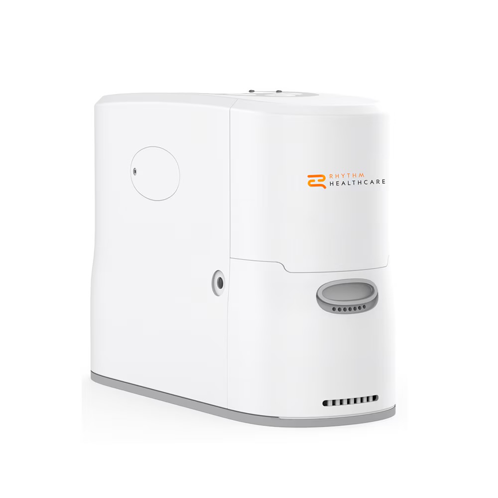 Rhythm Healthcare portable oxygen concentrator on a white background